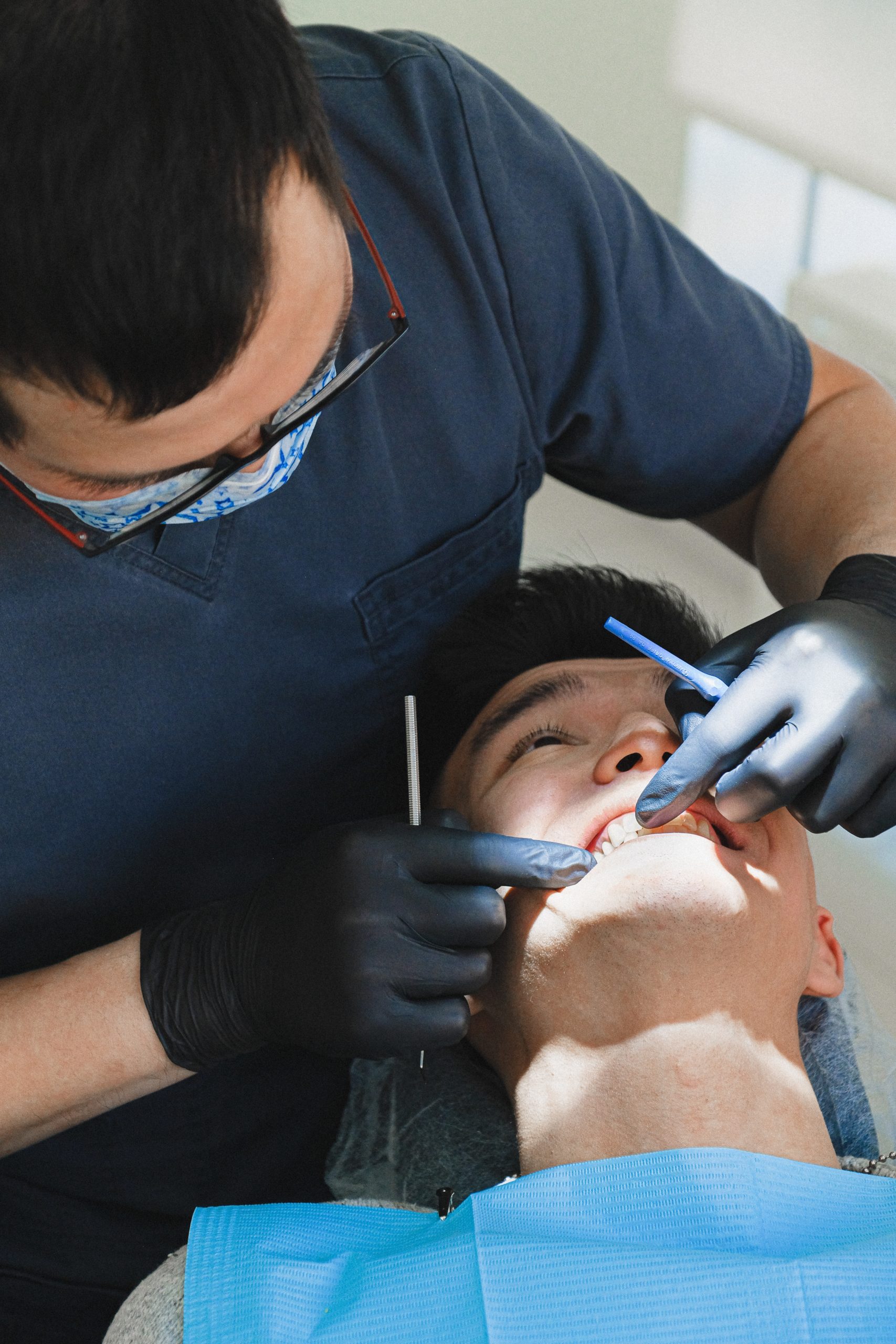 A man getting fitted for a dental crown