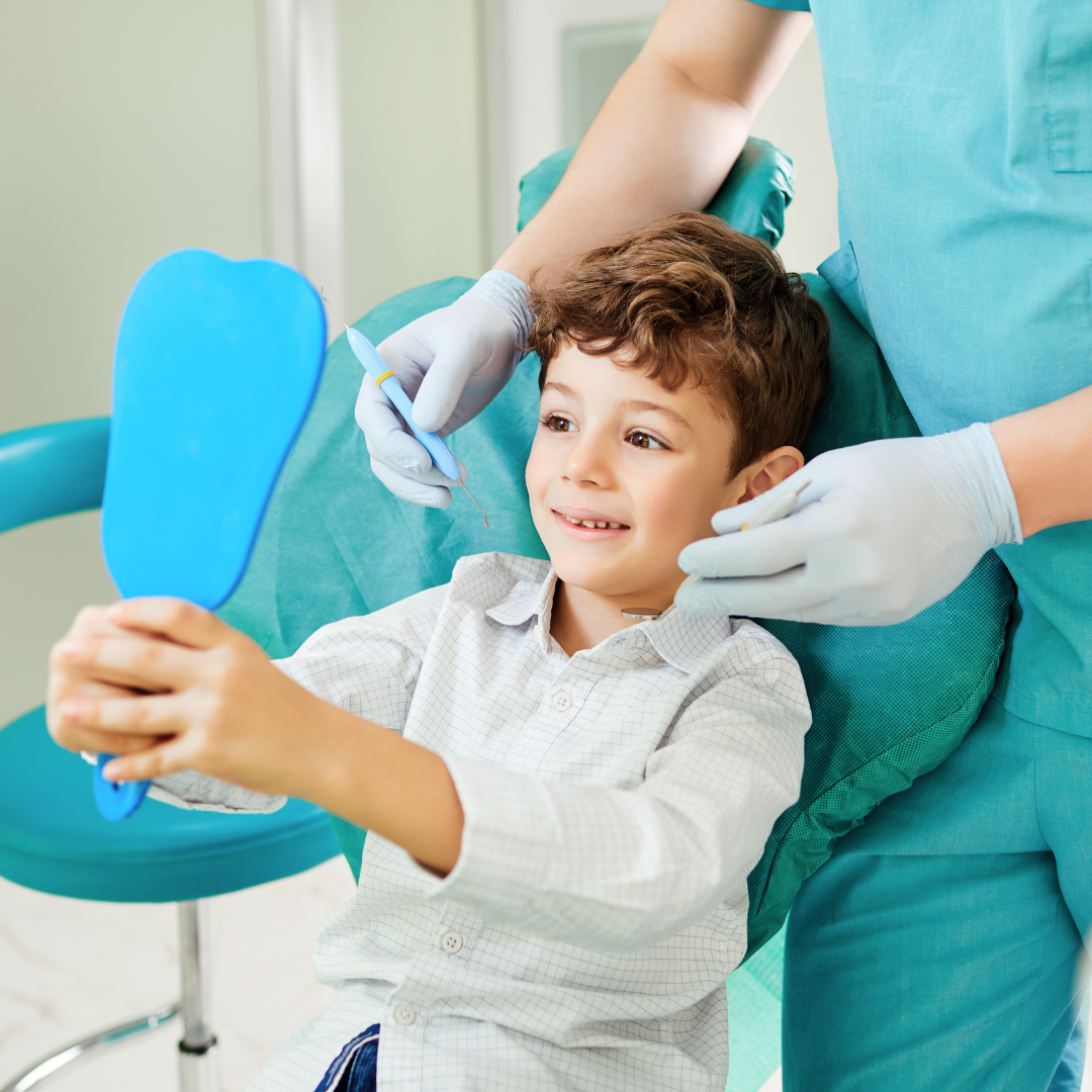A young boy at the pediatric dentist